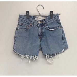 Medium blue Vintage Levi 550 cutoff shorts size 23